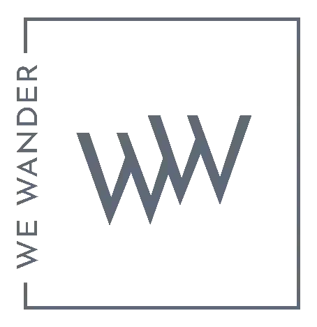We Wander logo
